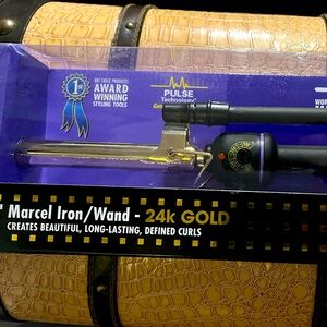 3/4” Hot Tools Professional curling iron.